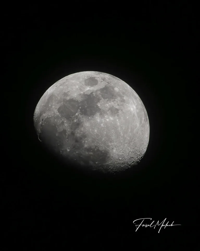 Textured moon in a dark sky photographed by Faisal Malaeb.
