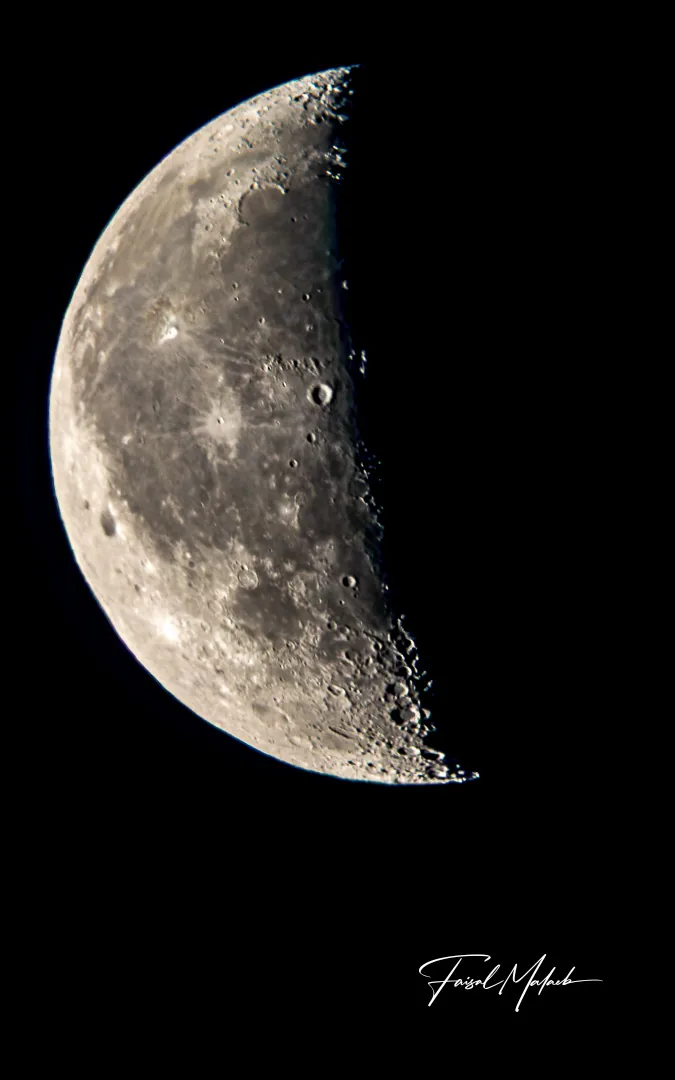 Crescent moon close-up photographed by Faisal Malaeb.